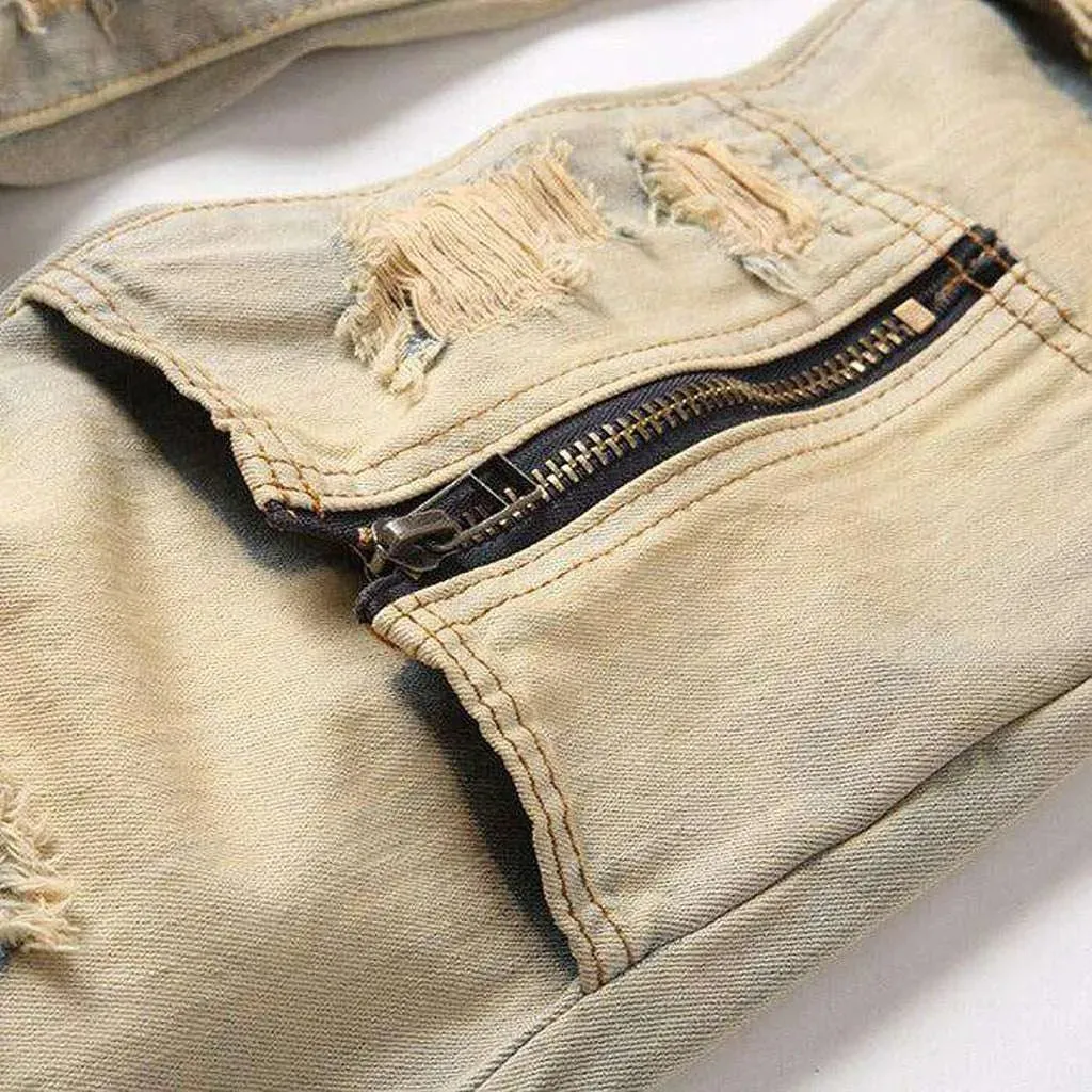 Distressed men's jeans with zippers