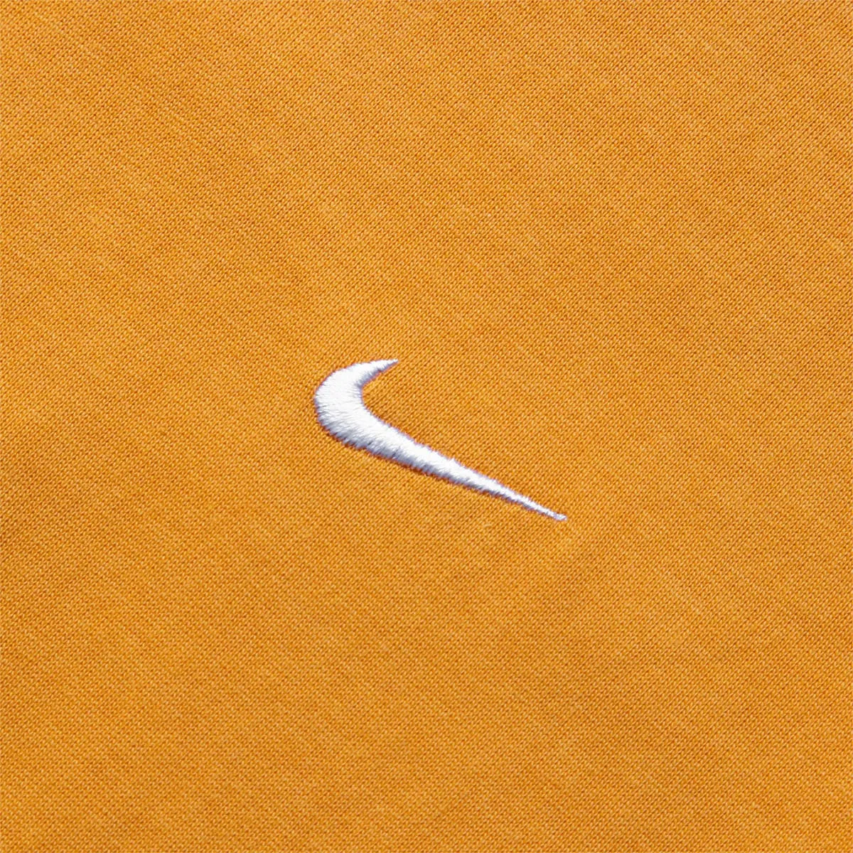 SOLO SWOOSH KNIT TOP